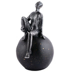 Men Sitting on Ball Showpiece for Home Decor Showpiece, Atlas Sculpture for Office Table Décor multicolour